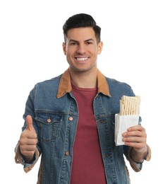 Photo of Man with delicious shawarma on white background