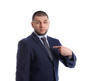 Man in suit pointing at himself on white background