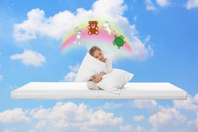 Sweet dreams. Sleepy girl hugging pillow on mattress in blue sky and dreaming about her toys