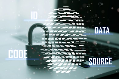 Fingerprint identification. Metal lock and laptop, closeup