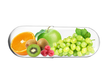 Image of Transparent capsule with different fruits and berries rich in vitamins on white background