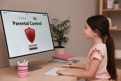 Little girl having access restriction by parental control on computer at home. Child safety