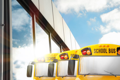 Yellow school buses outdoors. Transport for students