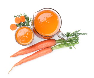 Photo of Freshly made carrot juice isolated on white, top view