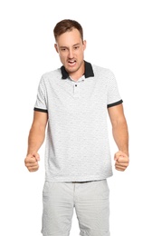 Young man in casual clothes posing on white background
