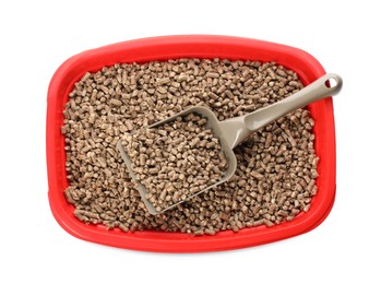 Red cat litter tray with filler and scoop isolated on white, top view