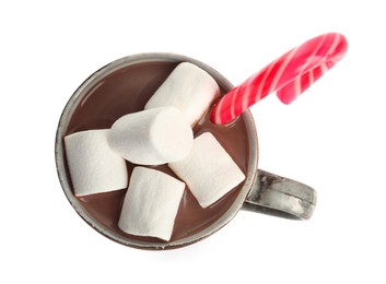 Cup of delicious hot chocolate with marshmallows and candy cane isolated on white, top view