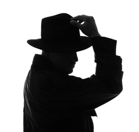 Photo of Silhouette of old fashioned detective on white background