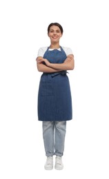 Photo of Young woman in blue apron on white background
