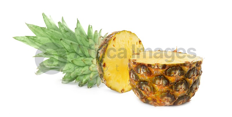 Photo of Cut fresh juicy pineapple on white background