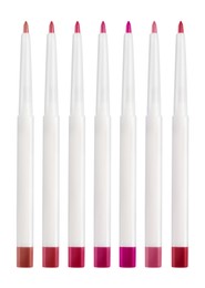Set with lip pencils of different shades on white background. Decorative cosmetics