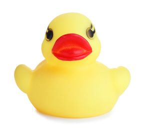 Photo of Adorable yellow toy duck isolated on white