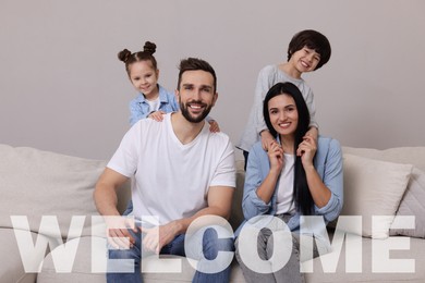 Word Welcome and portrait of happy family on sofa