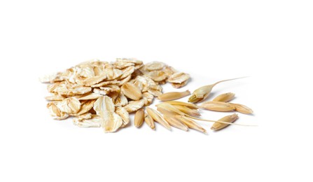 Pile of raw oatmeal on white background