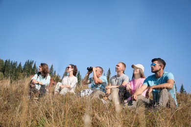 Photo of Group of people spending time together in mountains