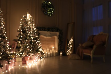Photo of Blurred view of festive room interior with Christmas trees