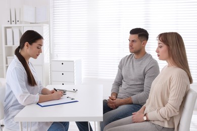 Couple having appointment with STD specialist in clinic