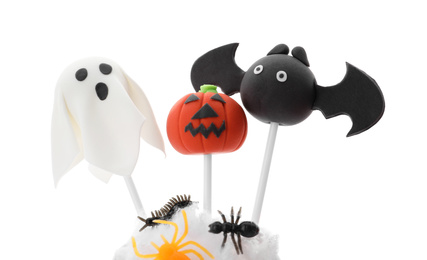 Delicious Halloween themed cake pops on white background