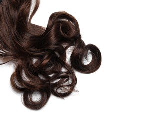 Beautiful dark brown curly hair isolated on white, top view