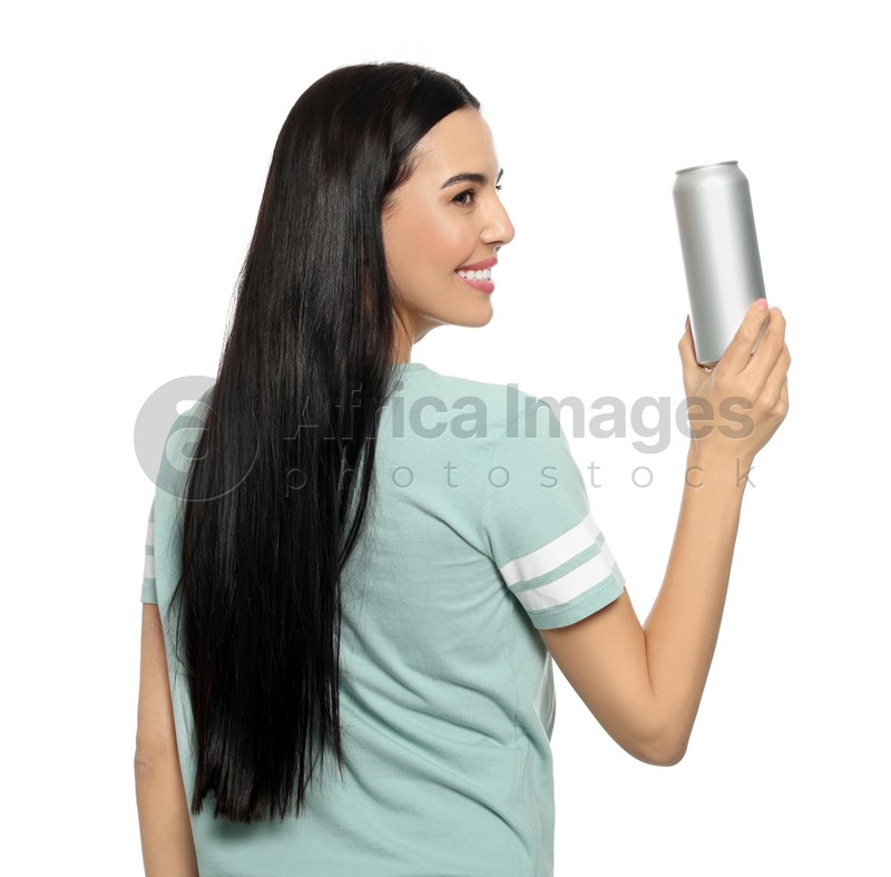 Beautiful happy woman holding beverage can on white background