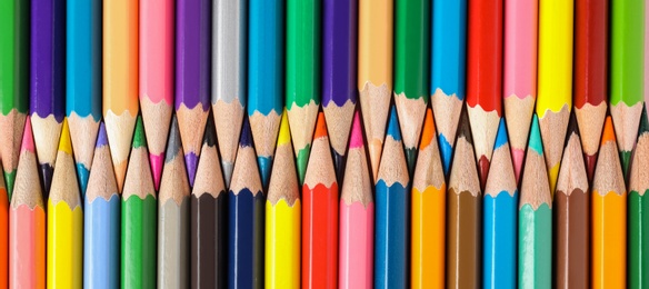 Different color pencils as background, top view