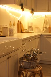 Cozy kitchen decorated for Christmas. Interior design