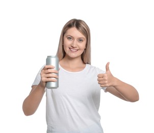 Photo of Beautiful happy woman holding red beverage can and showing thumbs up on white background