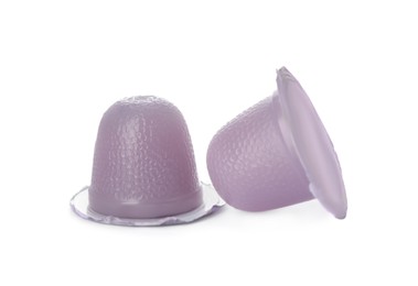 Delicious violet jelly cups on white background