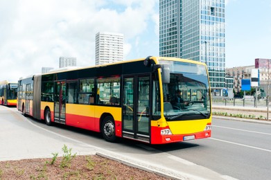 Modern bus on city street. Public transport