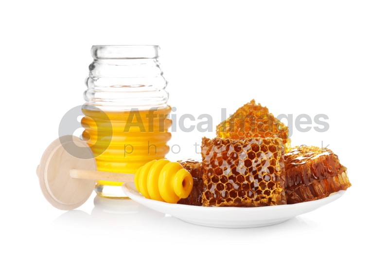 Photo of Composition with jar of honey on white background