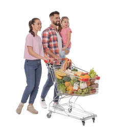 Happy family with shopping cart full of groceries on white background