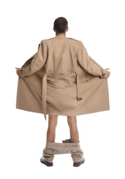 Exhibitionist exposing naked body under coat isolated on white, back view