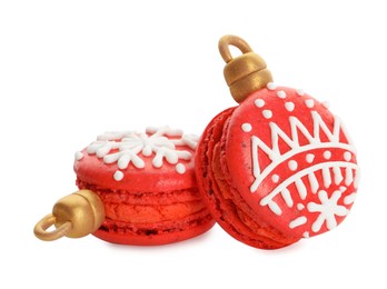 Photo of Beautifully decorated Christmas macarons on white background