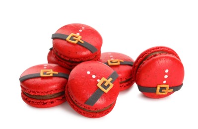 Pile of beautifully decorated Christmas macarons on white background