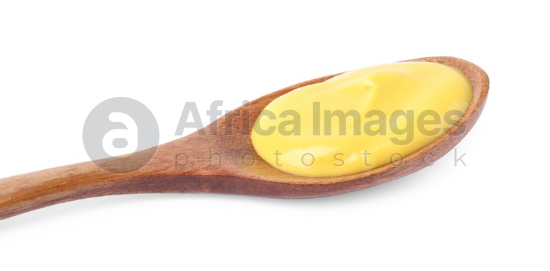 Delicious mustard in wooden spoon isolated on white, closeup