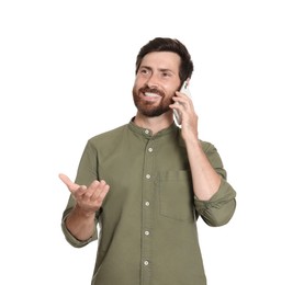 Handsome man talking on phone against white background