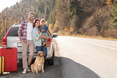 Photo of Parents, their daughter and dog near car outdoors, space for text. Family traveling with pet