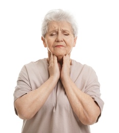 Elderly woman suffering from sore throat on white background
