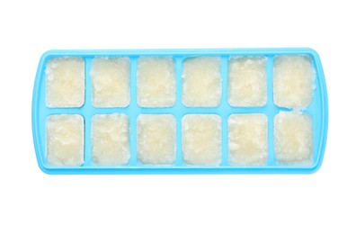 Cauliflower puree in ice cube tray isolated on white, top view