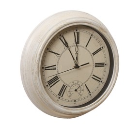 Stylish vintage wall clock showing five minutes until midnight on white background. New Year countdown