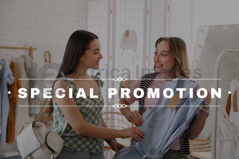 Image of Special promotion. Women choosing dress to buy in showroom