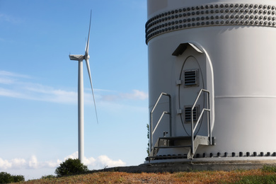 Entrance to wind turbine power generator outdoors. Alternative energy source