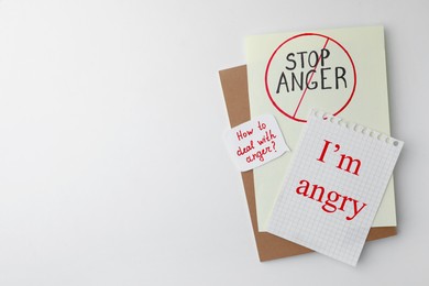 Photo of Anger management. Flat lay composition with different inscriptions on white background, space for text