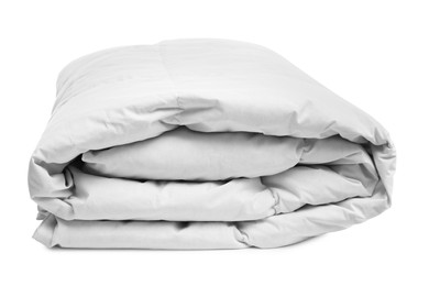 Photo of Folded soft blanket on white background. Household textile