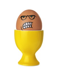 Photo of Egg with drawn angry face in cup isolated on white