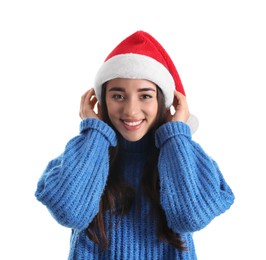 Beautiful woman wearing Santa Claus hat on white background