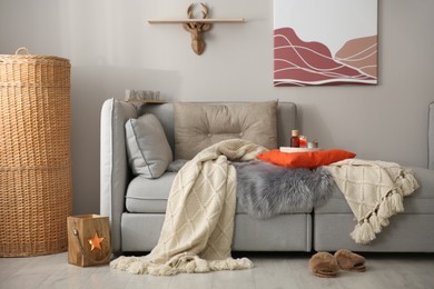 Spacious living room with comfortable sofa. Interior design