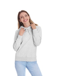 Photo of Portrait of woman in hoodie sweater on white background. Space for design