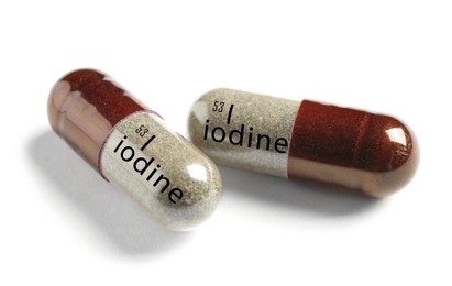Iodine capsules on white background. Mineral element