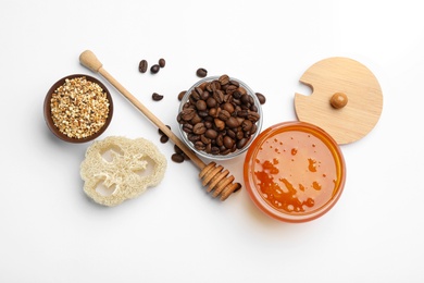Different ingredients for handmade face mask on white background, top view